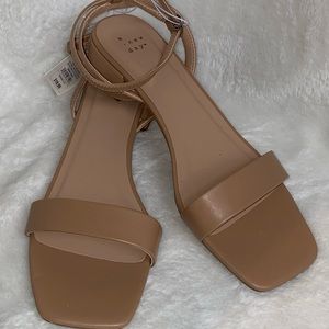 A new day, beige flats with a strap. Size 11, 91/2, 6.